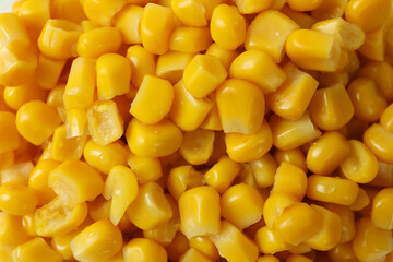 Tasty canned corn on whole background, close up