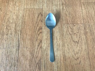 spoon of cutlery on the wood table 