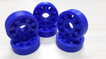 a collection of plastic bearings made using a three-dimensional printer