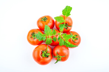 Fresh tomatoes on white background