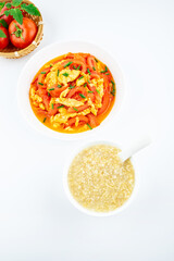 Chinese food set meal quinoa millet porridge with tomato scrambled eggs