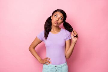 Portrait of charming girlish girl creating solution copy space pout lips isolated over pink pastel color background