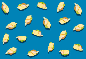 A pattern of sandwiches with sausage, cheese and salad with white bread on a blue background. Grocery background.