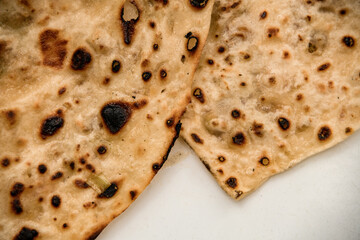 close-up of freshly fried pita bread or flatbread. Flapjack background.