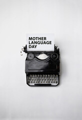 Mother Language Day
vintage typewriter with paper