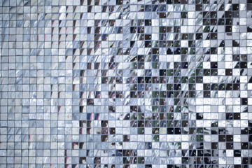 Silver square sequins. High resolution pattern. View from above. Copy space.