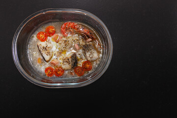 Tray with baked cod with vegetables