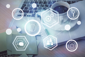 Obraz premium Double exposure of social network drawing and desktop with coffee and items on table background. Concept of international connection.