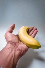 hand with banana