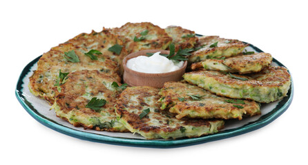Delicious zucchini fritters with sour cream on white background