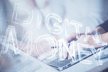 Double exposure of woman hands typing on computer and crypto market theme hologram drawing....