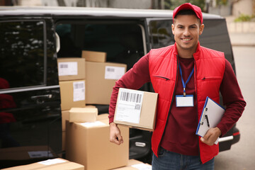 Courier with clipboard and parcel near delivery van outdoors. Space for text