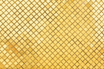 Golden mosaic glass on the wall.