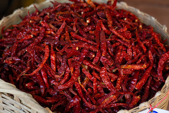 organic dried red spicy chillies in market. Dried chillies in Thailand's Food Market for background. 
