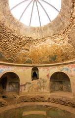 Interior of the bathroom in Stabian Baths at ancient Roman city of Pompei, buried under ashes after...