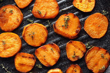 Tasty grilled sweet potato on pan