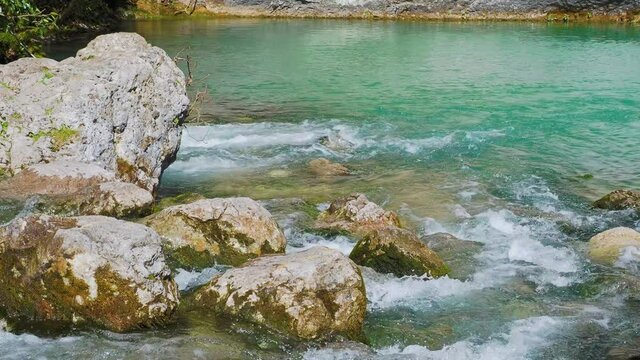 Blue lake of karst origin on right bank of Bzyb River. Landmark in Abkhazia.