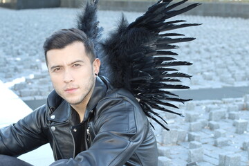 Urban angel with black wings 
