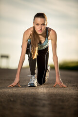Young woman running ,  preparing for the run. 