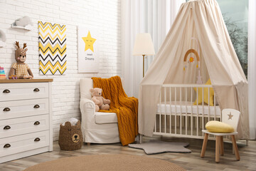 Stylish baby's room with comfortable cot. Interior design © New Africa