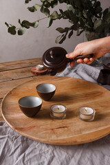 Traditional Asian Tea Set - ceramic teapot and teacups for tea ceremony on a wooden table. Vintage style. With space for text. China, tea, tableware, tradition, health, tea ceremony, Asia.
