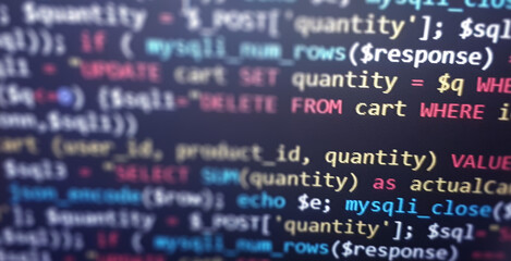 Fototapeta premium Colorful programming php and html code on a monitor. PHP language code closeup. Backend programming, software development concept