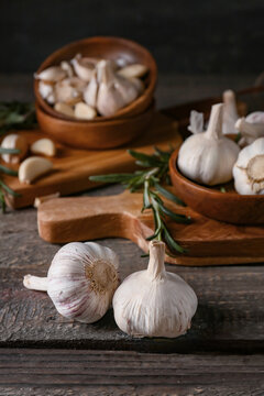 Fresh garlic on wooden background