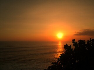 Fototapeta na wymiar A beautiful sunset in Uluwatu, Bali, Indonesia
