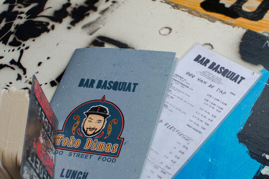 Bar "Basquiat" in Javastraat street, Oost, Amsterdam, Netherlands. View of menu on the table.