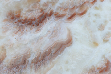 Interior background, texture, pastel pink, beige marble or onyx surface. Trendy interior decor concept. Template for fashion or jewelry store. Horizontal format. Place for your text. Copy space