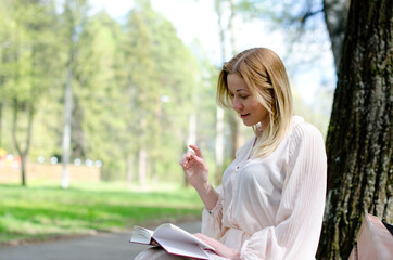 young girl in a dress in the park