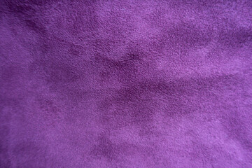 Fototapeta na wymiar Backdrop - violet faux suede fabric from above