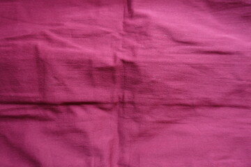 Top view of jammed reddish rose viscose fabric