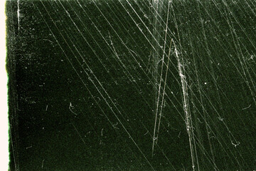 Toned dark scratched grunge film background
