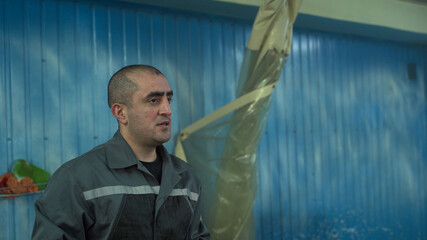 Portrait of male worker of Caucasian nationality close-up.