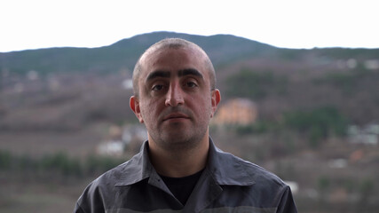 Portrait of male worker of Caucasian nationality close-up.