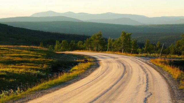 Dirt road in high country landscape