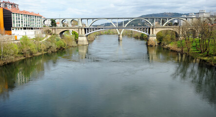 New Bridge Ponte Nova and railway viaduct over the river Miño in Ourense Orense, Galicia, Spain 