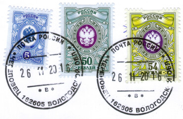 Postage stamps issued in Russia with the image of the State Postal Administration Emblem. From the...
