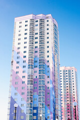 windows on colorful building, new building, residential area 