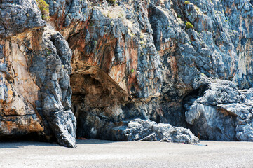 The rocky section of the Troncone beach designated for naturism since 2011,  Marina di Camerota,...