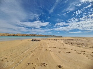 footprints on the beach