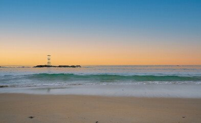 The sea and sunset sky with lighthouse.  Beautiful nature for holiday