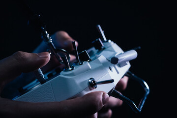 man piloting fpv drone