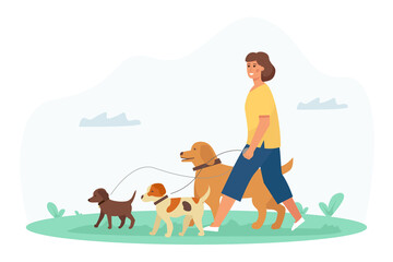 A dog walker, a young pretty woman enjoys the activity in the park with her pets. Pet Care Service.