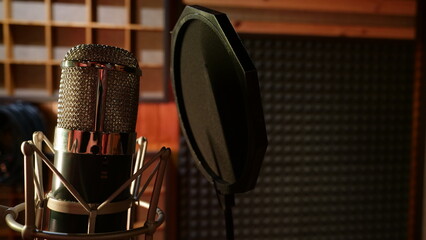 music group rehearsing, testing vocals and mastering in a professional recording studio