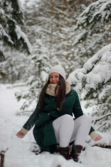 Fototapeta na wymiar girl in winter forest 