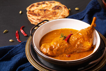 Food concept Homemade Tikka Masala Chicken or red curry on black background with copy space