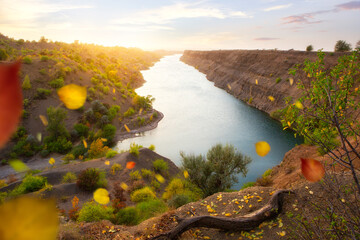 Autumn sunset on a quarry lake