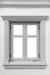 White vintage wooden window frame and white plaster wall